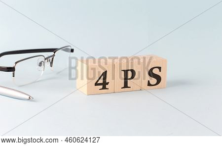 Text 4ps Written On Wooden Cubes On Blue Background