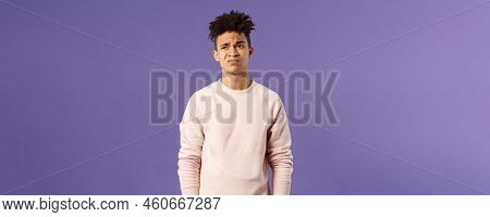 Portrait Of Young Reluctant And Displeased Man Having Hesitating, Unwilling To Go Somewhere, Dont Ha