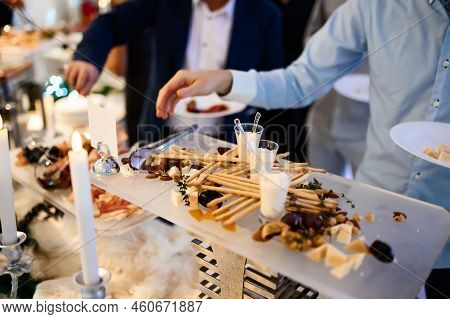 Bread Sticks, Sauce And More On The Table