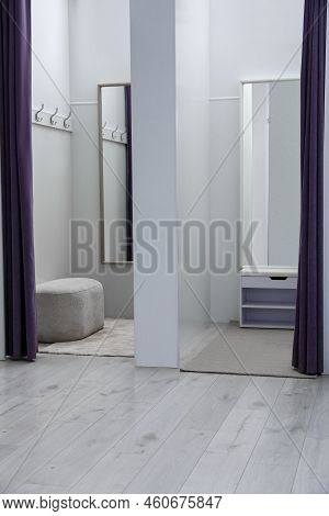 Empty Dressing Rooms In Fashion Store. Stylish Interior
