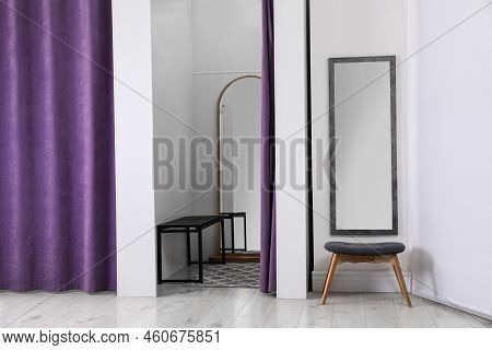 Empty Dressing Room In Fashion Store. Stylish Interior
