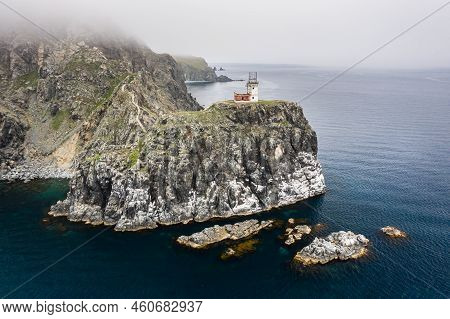An Old Ruined Lighthouse On Askold Island In The East Sea. A Beautiful Ruined Staircase Leading To T