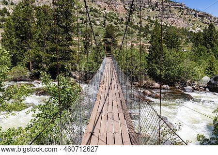 Suspension Bridge Over The Middle Popo Agie River At Sinks Canyon, Lander, Wyoming, Usa