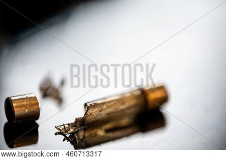 Brown Damaged Fuse That Has Blown And Defective.