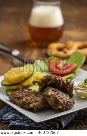 Closeup Of A Bavarian Minced Meat Fleischpflanzerl With Salad