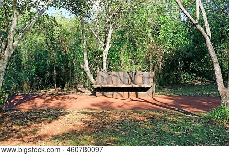 Empty Stone Bench On The Hiking Trial Of Iguasu National Park, Puerto Iguazu, Argentina, South Ameri