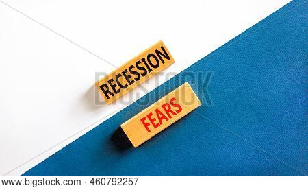 Recession Fears Symbol. Concept Words Recession Fears On Wooden Blocks On A Beautiful White And Blue