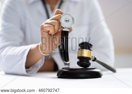 Forensic Exam Doctor. Judge Gavel And Criminal Examination