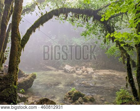 View Of Natural Arch With Fog Over The River Aniene In Lazio Italy