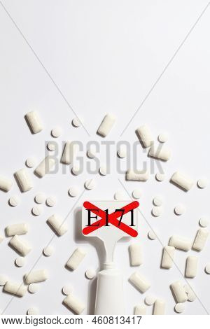 Titanium Dioxide, E171, Dangerous Additive Concept. Gum, Pills, Toothpaste Or Cream And Sign With E1