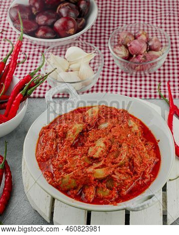 Made From Chilies And Onions, Then Given Anchovies Or Pieces Of Petai Or Jengkol. When Stirred Toget