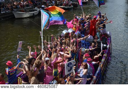 Amsterdam, Netherlands - August 06, 2022: Many People In Boats At Lgbt Pride Parade On River