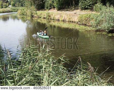 Mother And Son Are Kayaking On The River Durme In Lokeren, Belgium