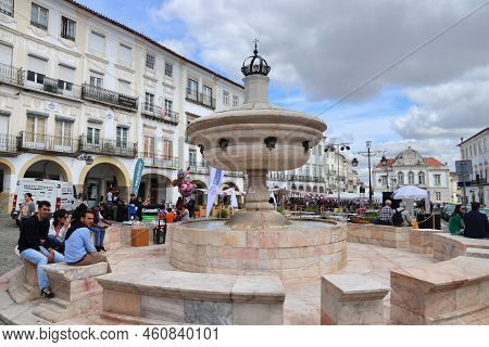 Evora, Portugal - June 3, 2018: People Visit Giraldo Square (praca Do Giraldo) In Evora, Portugal. E