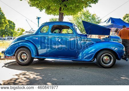 Falcon Heights, Mn - June 17, 2022: Low Perspective Side View Of A 1939 Plymouth P8 Deluxe Business 