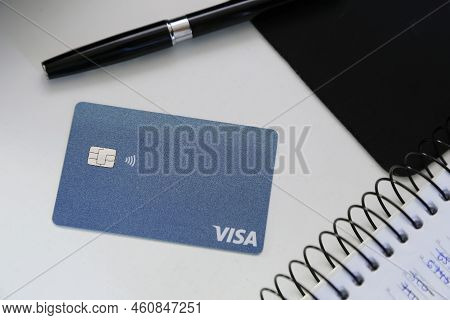 Minas Gerais, Brazil - August 28, 2022: Blue Contactless Credit Card And Visa Brand