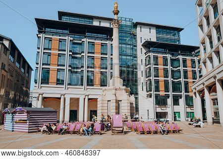 London, Uk - August 26, 2022: People Relax On Deck Chairs At The Paternoster Square, An Urban Develo