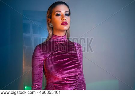 Glamorous Portrait Of A Young Beautiful Blonde In A Stylish Scarlet Short Dress, Stylish Shooting Wi