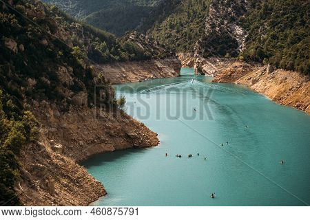 Kayaking On The Lake. Several Kayaks Going Towards To The Gorge Of Congost De Mont-rebei, Catalonia,