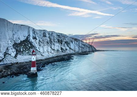 Beautiful Summer Sunrise Landscape Image Of Beachy Head Lighthouse In South Downs National Park In E