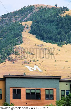 August 26, 2022 In Missoula, Mt:  Buildings At The Downtown District With The Letter M On A Hillside