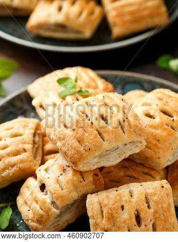 Mini Beef Patties With Vegetables And Red Wine Wrapped In Puff Pastry