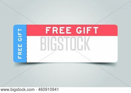 Blue And Orange Color Ticket With Word Free Gift And White Copy Psace On Gray Background