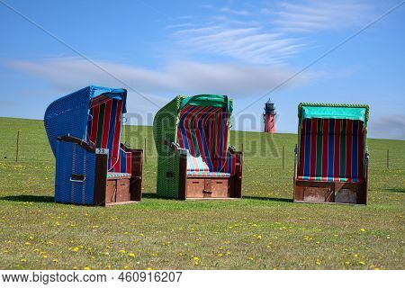 Panoramic Image Of The Landscape Along The Dikes Of Pellworm With Beach Chairs, North Frisia, German