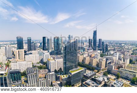 7.22.2022 Warsaw, Poland. Eclectic Developing City. Neomodernism As A Skyline Architecture. Aerial D
