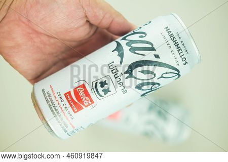 Samut Prakan, Thailand - August 26, 2022 : Man Hand Show A Can Of Coca-cola Brand Soda, Limited Edit