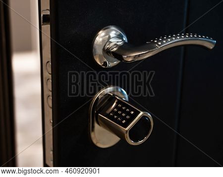 Open Door To The Apartment With A Combination Lock. Keyless Entry.