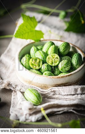 Cucamelon, Melothria Scabra In A Bowl. Organic Mouse Melon Fruits On Gray Background