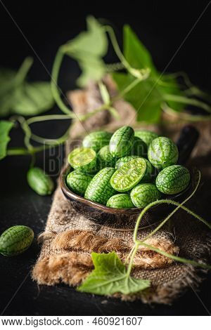 Cucamelon, Melothria Scabra In A Bowl. Organic Mouse Melon Fruits On Dark Background