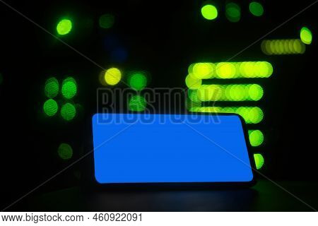 An Empty Form With A Background On The Phone Screen, Copy Space. Smartphone On The Background Of A D