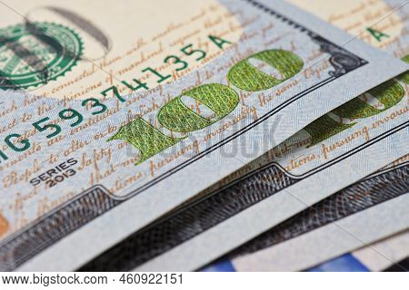 American Banknotes Of One Hundred Dollars. Fragment Of Bills Close-up. New Sample Money. Focus On Th