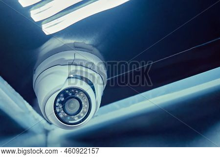 Indoor Surveillance Security Camera In The Elevator Of A Residential Building. Cctv Camera On An Apa