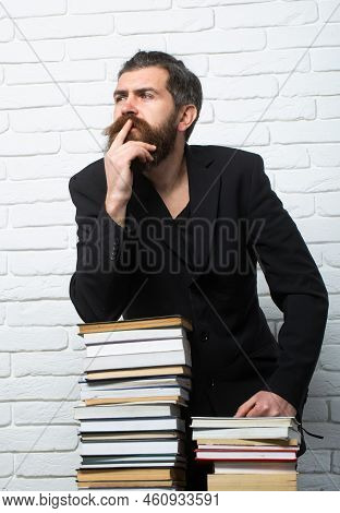 Thinking Man. Portrait Of A Funny Teacher Or Professor With Book Stack. Thinking Serious Mature Teac