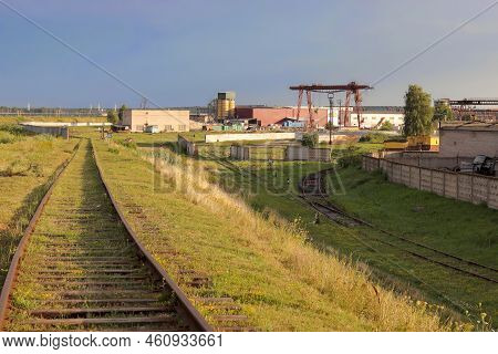 The Railway Before Sunset. The Intersection Of Old Rails.