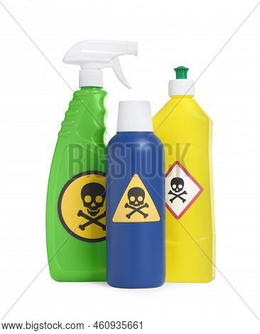 Bottles Of Toxic Household Chemicals With Warning Signs On White Background