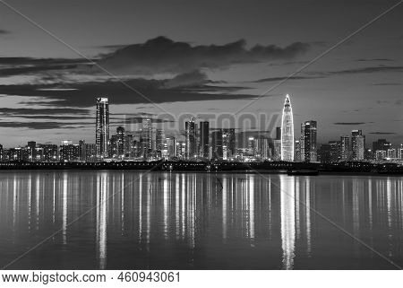 Skyline Of Shenzhen City, China At Dusk. Viewed From Hong Kong Border Lau Fau Shan