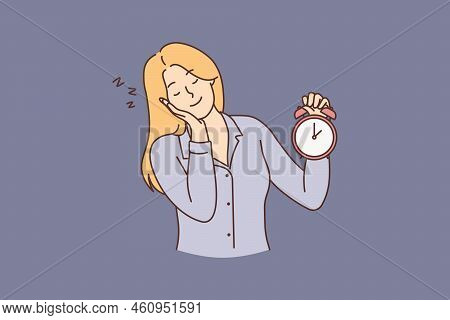 Tired Woman Hold Clock Feeling Sleepy. Exhausted Young Female With Alarm Miss Time In Morning. Fatig