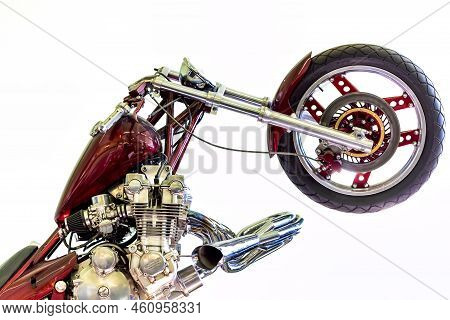 Vintage High Performance Motorbike Isolated On White Background. Abstract Angle Showing Chrome Engin