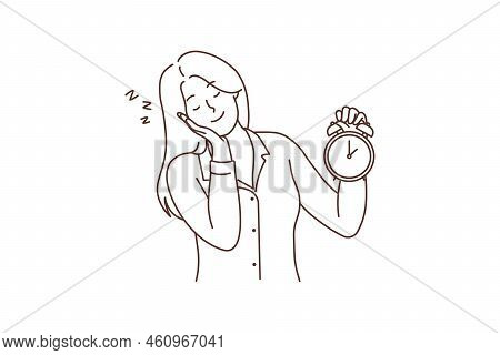 Tired Woman Hold Clock Feeling Sleepy. Exhausted Young Female With Alarm Miss Time In Morning. Fatig