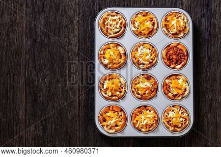 Sloppy Joe Cups, Hamburger Bun Cups With Ground Beef And Onions Tossed In Sloppy Joe Sauce And Toppe