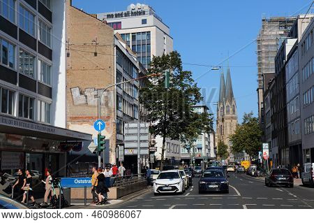 Dusseldorf, Germany - September 19, 2020: People Cross The Street In Downtown Dusseldorf, Germany. D