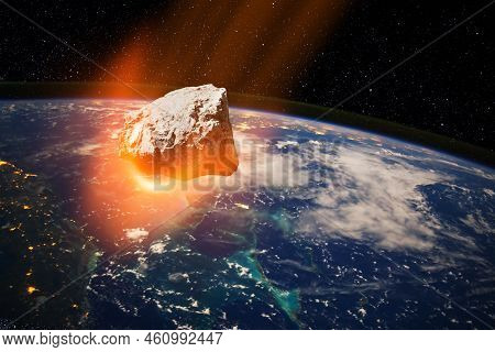 Planet Earth And Big Asteroid In The Space. Potentially Hazardous Asteroids. Asteroid In Outer Space