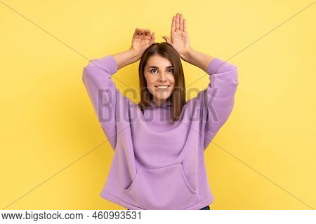 Portrait Of Funny Carefree Attractive Woman Showing Bunny Ears Gesture And Looking Playful Happy, Ch