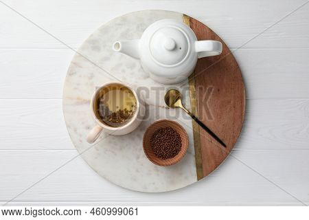 Freshly Made Buckwheat Tea Served On White Wooden Table, Top View
