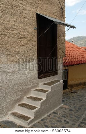 ISLAND SAMOS, GREEK CIRCA JUNE 2005 - Stairs and entrance in brown