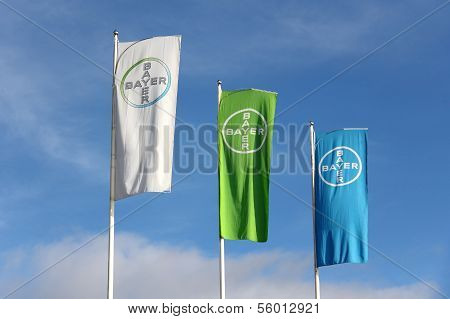 Bayer Flags Against Blue Sky